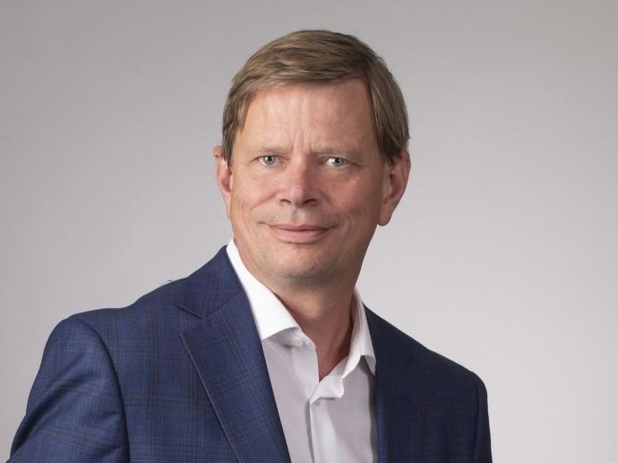 male employee in suit headshot