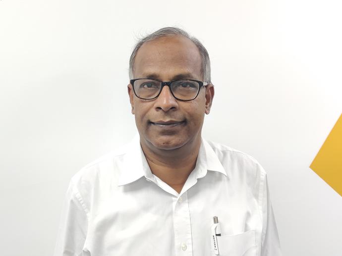 male employee with white shirt and glasses