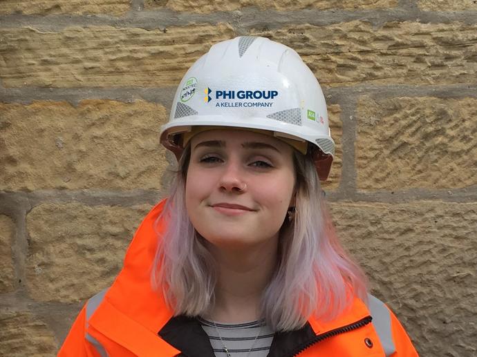 female keller employee in ppe