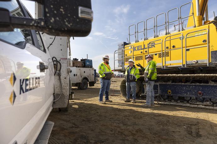 Three Keller employees working on site