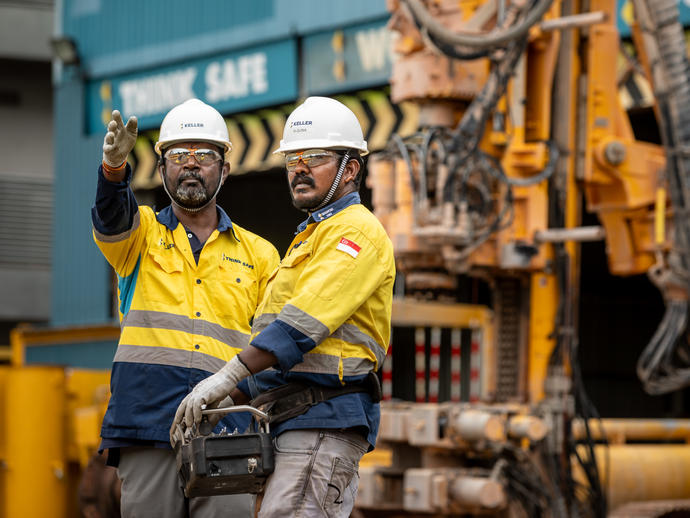 Two Keller employees talking on site