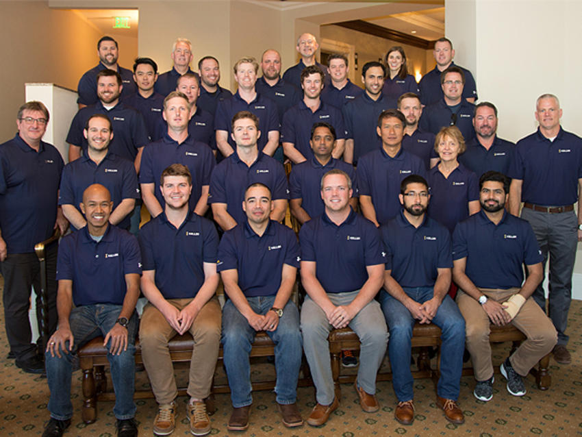 group of keller employees in keller polo shirts